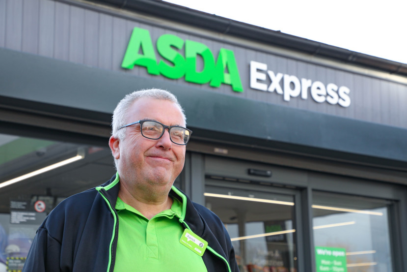 Colleague smiling outside Asda Express store