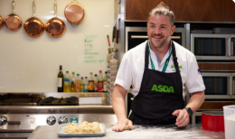 Colleague in apron preparing to bake.