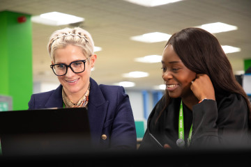 Colleagues working together on a laptop